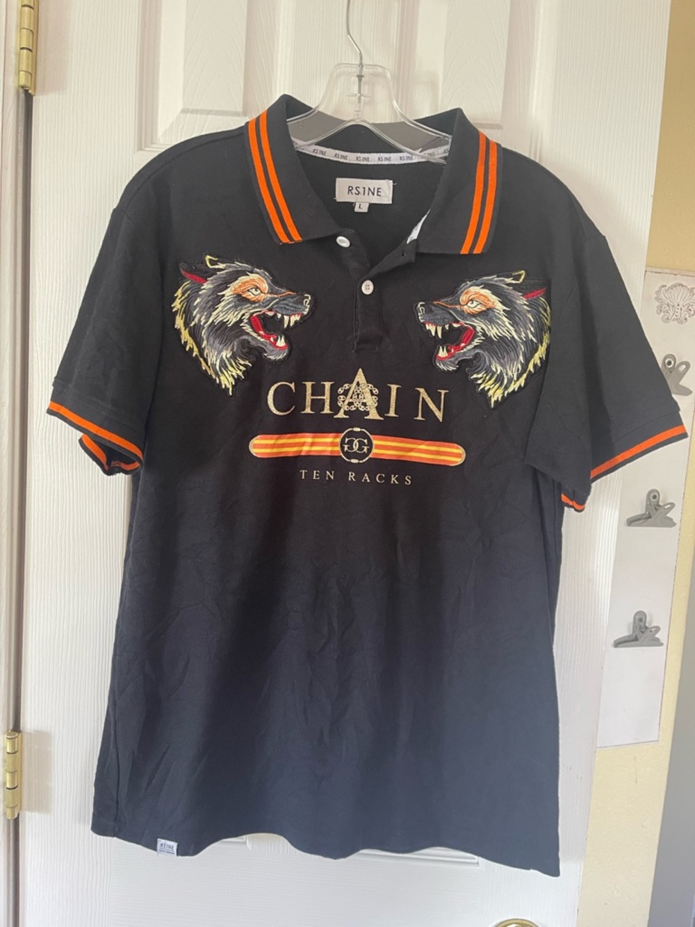 Men's Black Polo with Orange Trim & Wolf Embroidery